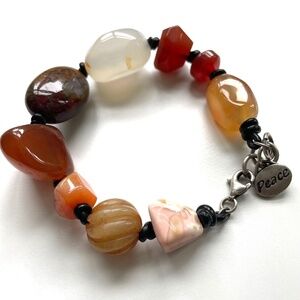 Fall colors: large semi precious stone knotted bracelet with Peace charm